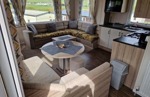 Aberystwyth House | Experience Coastal Bliss in Our Modern 2019 Sea Viev 2 Bedroom static caravan at Clarach Bay Holiday Village!
