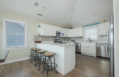 Ocean Sands House | Experience luxury at 1861 - Into the Mystic, a spacious 6-bedroom oceanfront home in Corolla, NC.