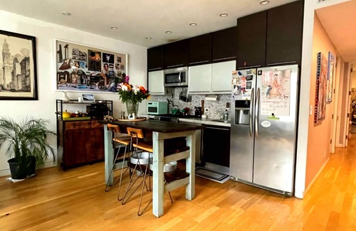 Greenpoint Condo | Experience Luxury by the Water:Private Garden & Unforgettable Views!