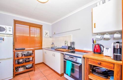 Brenton-on-Sea Apartment | Experience Nature at Brenton on Sea with breakers dolphins and whales
