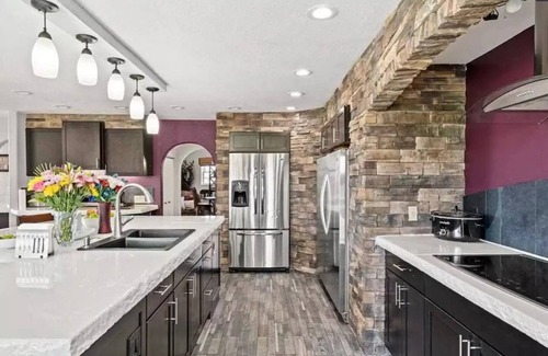 Scottsbluff House | Experience Scottsbluff charm in our spacious 4-bedroom retreat
