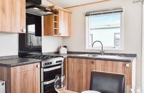 Heysham Cottage | Experience the charm and comfort of Peachy, your ideal holiday home by the sea.