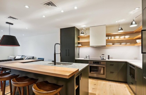 Stowe Area Condo | Experience the cozy charm of the Treehouse at Spruce Peak!