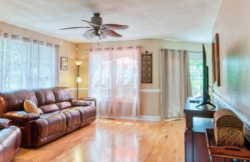 Johnson City House | Experience the serenity of a peaceful neighborhood and the excitement of the city .