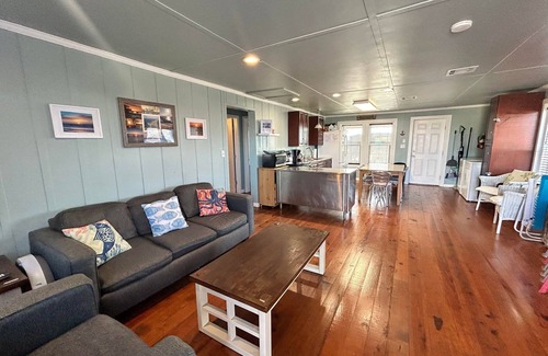 Golden Meadow House | Experience waterfront living at Wahoo in Grand Isle, LA, with boat access and cozy amenities.