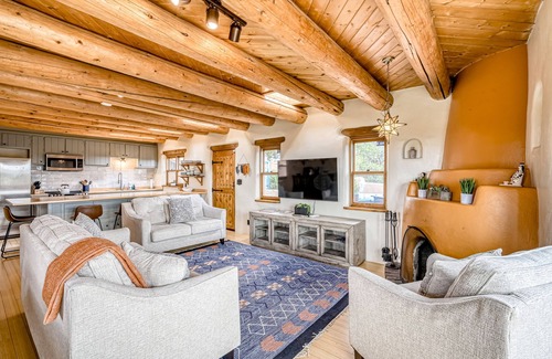 Santa Fe House | Exquisite home with hot tub, fireplace, mountain view, & washer/dryer