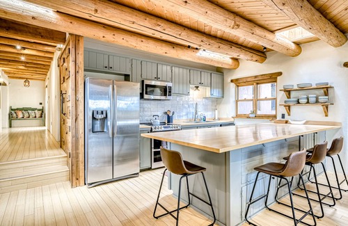 Santa Fe House | Exquisite home with hot tub, fireplace, mountain view, & washer/dryer