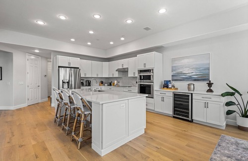 Vanderbilt Beach House | Exquisite waterfront home with lanai, heated pool and spa(hot tub), and internet