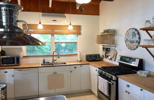 Hartswell House | Exuma Beautiful Waterfront Home with Dock on Gorgeous Moriah Harbour.
