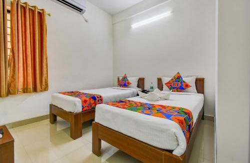 Mylapore Hotel | FabExpress PAS Residency - Nr Marina Beach