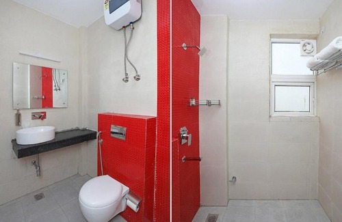 Sector 31 Hotel | FabHotel Golden Leaf