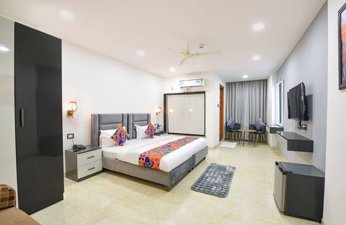 DLF Farms Hotel | FabHotel Prime The Aroma