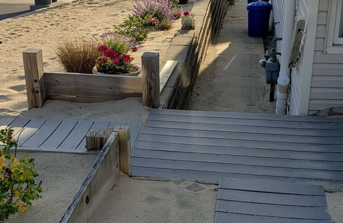 Manasquan House | Fabulous beach cottage steps to the most desirable Riddle Way beach Manasquan!