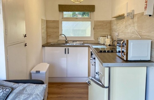 Bont Newydd Ski Chalet | Fabulous little hideaway Lodge on a country holiday park near Caernarfon