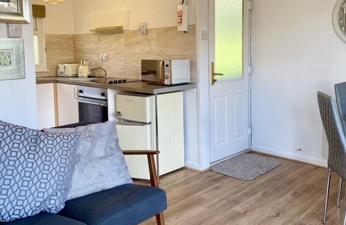 Bont Newydd Ski Chalet | Fabulous little hideaway Lodge on a country holiday park near Caernarfon