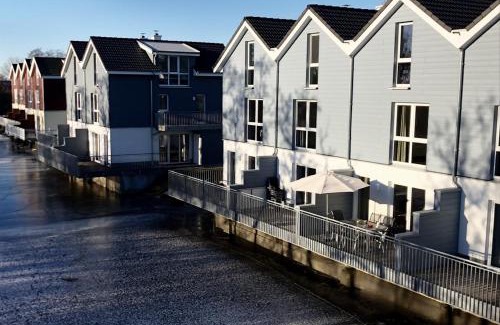 Schillig Apartment | Familienhaus an der Nordsee - Sauna - Kamin - Südterrasse direkt über dem Wasser