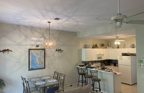 Burnt Store Villa | Family And Pet Friendly, Two Bed Room Villa With Garage. Steps From Heated Pool.