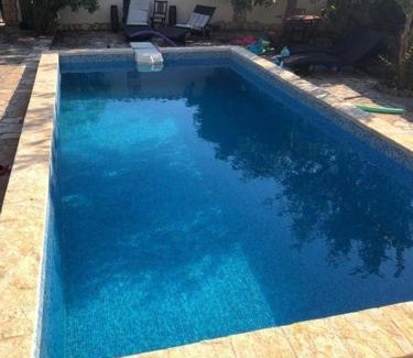 Pirovac Apartment | Family apartment with pool close to sea