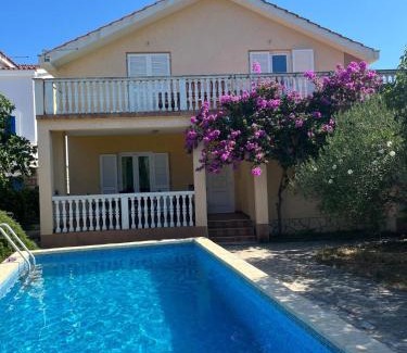 Pirovac Apartment | Family apartment with pool close to sea