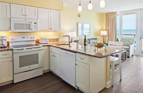 Ormond Beach Resort | Family-Friendly 2BR Oceanfront Condo – Balcony, Pool, Kitchen & Steps to Beach