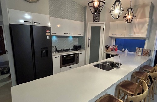 Caloundra West House | Family friendly coastal home centrally located, with a pool