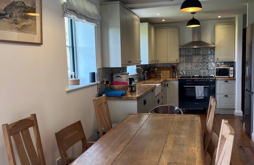 Bridport Cottage | Family Friendly Brewery Conversion on Jurassic Coast with own swimming lake.