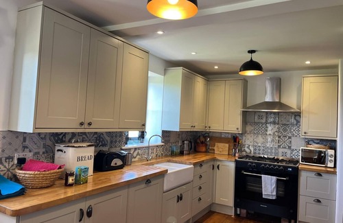 Bridport Cottage | Family Friendly Brewery Conversion on Jurassic Coast with own swimming lake.