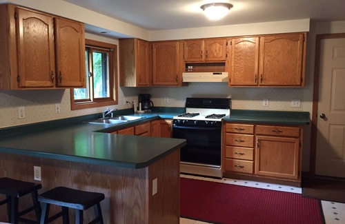 Au Train Cabin | Family Friendly cabin at AuTrain Lake! Big back yard and beach access! Swim/fish