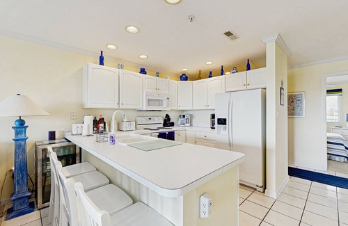 Heron Harbour Isle Condo | Family-friendly condo with beach access, pools, covered deck, W/D & AC