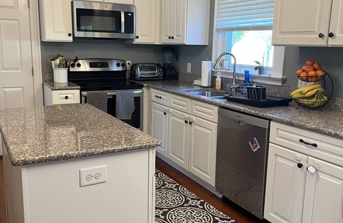 Sanford House | Family friendly home on over an acre with fire pit, screen porch, and more!