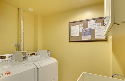 Powderhorn Park Condo | Family Friendly Including pets. Pet crate and crib/high pet crate.