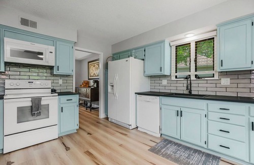 Lenexa House | Family-Friendly Lenexa Home ~ 3BR, Game Room, 2 King Beds & Patio