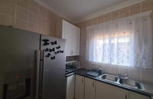 Greater Johannesburg Metropolitan Area House | Family friendly three bedroom Townhouse, in the heart of Midrand.