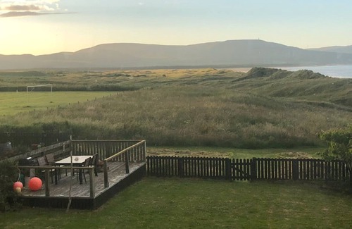 Dornoch House | Family Home with stunning beach and mountain views.