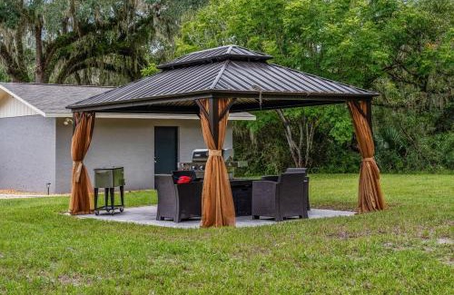 Crystal River House | Family Oasis Near Springs Game Room Yard Spa EV