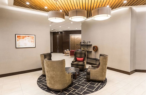 Greenville Downtown Apartment | Family Retreat w/Queen Beds, Indoor Pool Access, Near Peace Center & Museums