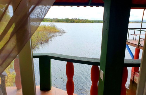 Arenosa House | Family run rustic casita's on Lake Gatun; fish, swim, sup, kayak, or just relax!
