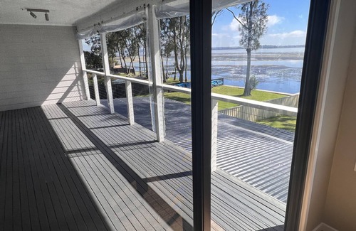 Gorokan House | Family-sized Waterfront Home with lake views & private jetty!
