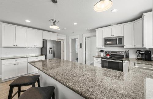 Bradenton Beach House | Family Tides - 2 Homes in 1 Steps to Beach w Rooftop Views Heated Pool Close to Bridge St