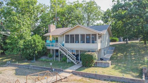 Lake Ozark House | Family Vacation on the lake water toys king bed