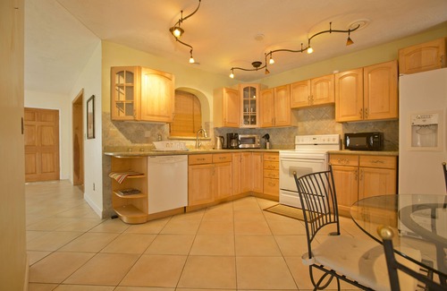 Garden Isles House | Family Waterfront Retreat – Private Pool, Hot Tub, Walk to Beach!