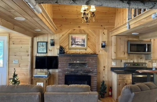 Belgrade House | Famous cottage directly on 100' private shoreline of pristine lake.
