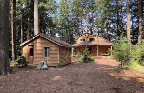 Belgrade House | Famous cottage directly on 100' private shoreline of pristine lake.
