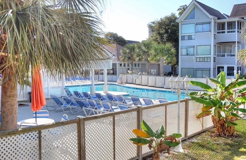 Vaught Condo | Fantastic Condo Adjacent to Harry the Hats and Across from the Apache Pier -