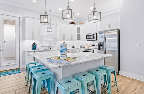 Emerald Waters Village House | Fantastic home close to beach w/shared pool, central AC, WiFi, balcony, & patio