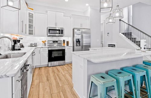 Emerald Waters Village House | Fantastic home close to beach w/shared pool, central AC, WiFi, balcony, & patio