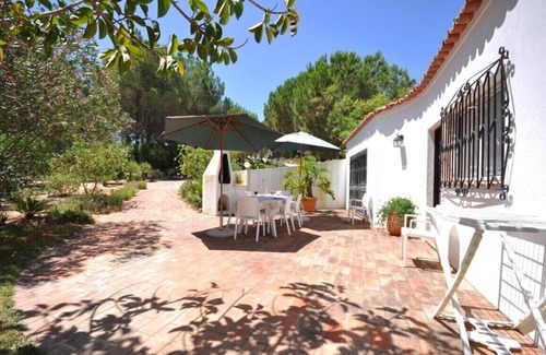 Almancil Villa | Fantastic Outdoor Area, Private Pool, Tennis Court & Golf Practice Facility