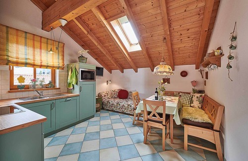 Hartmannsreut Apartment | Far-reaching views & well-being Roof terrace with mountain panorama, exposed roof truss & pure nature