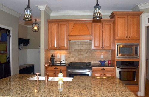 Suwanee Other | Farm Style home with a pool and game room to stretch out and have family fun.