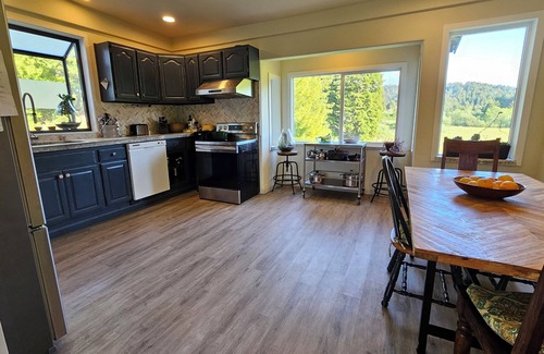 Eureka House | Farmhouse with 280 degree meadow views and amazing back patio.